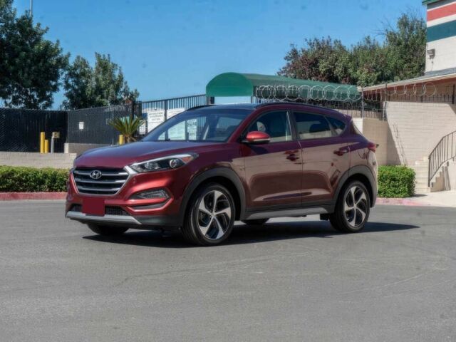 Червоний Хендай Туксон, об'ємом двигуна 1.6 л та пробігом 54 тис. км за 10300 $, фото 1 на Automoto.ua