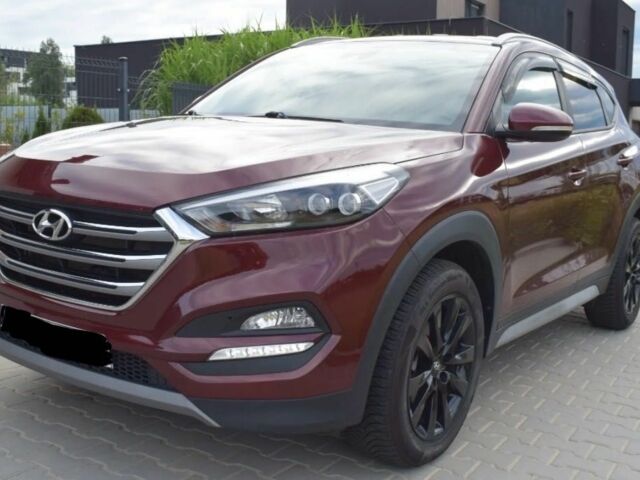 Красный Хендай Туксон, объемом двигателя 2 л и пробегом 34 тыс. км за 10000 $, фото 1 на Automoto.ua