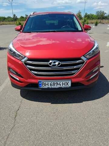 Червоний Хендай Туксон, об'ємом двигуна 2 л та пробігом 72 тис. км за 21500 $, фото 1 на Automoto.ua