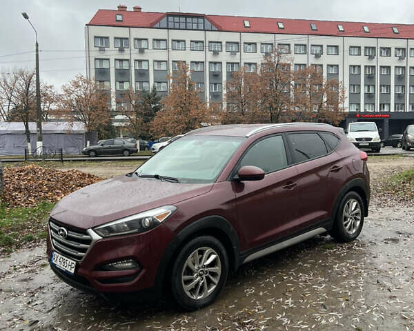 Червоний Хендай Туксон, об'ємом двигуна 2 л та пробігом 150 тис. км за 13300 $, фото 1 на Automoto.ua