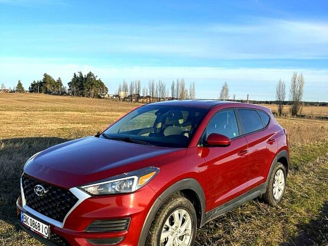 Красный Хендай Туксон, объемом двигателя 2 л и пробегом 130 тыс. км за 22000 $, фото 1 на Automoto.ua