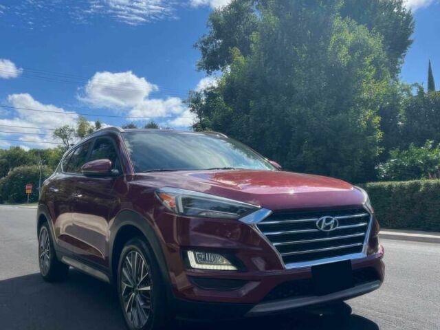 Червоний Хендай Туксон, об'ємом двигуна 2.4 л та пробігом 46 тис. км за 6400 $, фото 1 на Automoto.ua