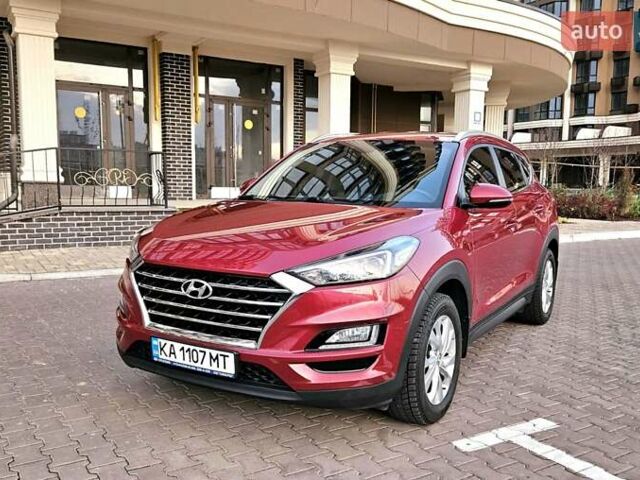 Красный Хендай Туксон, объемом двигателя 2 л и пробегом 94 тыс. км за 19500 $, фото 1 на Automoto.ua