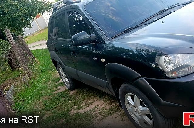 Хендай Туксон, объемом двигателя 2 л и пробегом 270 тыс. км за 6500 $, фото 1 на Automoto.ua