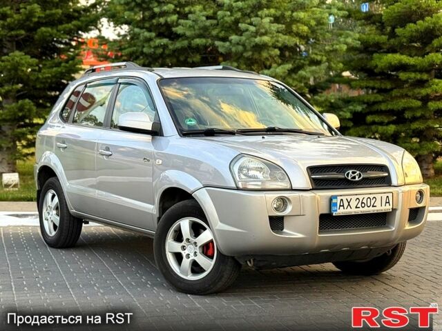 Серый Хендай Туксон, объемом двигателя 2 л и пробегом 156 тыс. км за 6999 $, фото 1 на Automoto.ua