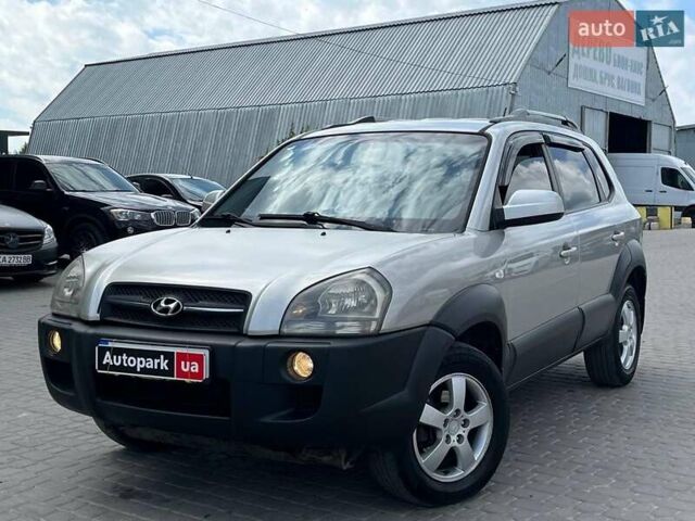 Серый Хендай Туксон, объемом двигателя 2 л и пробегом 255 тыс. км за 7490 $, фото 1 на Automoto.ua