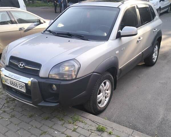 Сірий Хендай Туксон, об'ємом двигуна 1.98 л та пробігом 305 тис. км за 8700 $, фото 1 на Automoto.ua