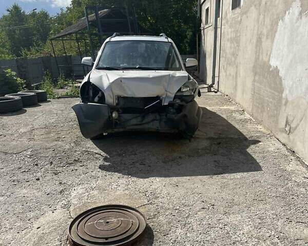 Сірий Хендай Туксон, об'ємом двигуна 2 л та пробігом 250 тис. км за 2800 $, фото 1 на Automoto.ua