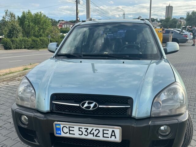 Серый Хендай Туксон, объемом двигателя 2 л и пробегом 240 тыс. км за 6500 $, фото 1 на Automoto.ua