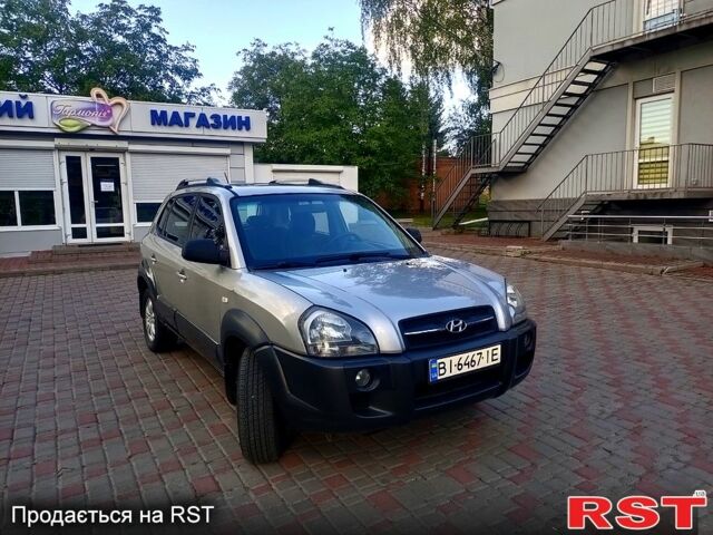 Серый Хендай Туксон, объемом двигателя 2.7 л и пробегом 280 тыс. км за 6500 $, фото 1 на Automoto.ua