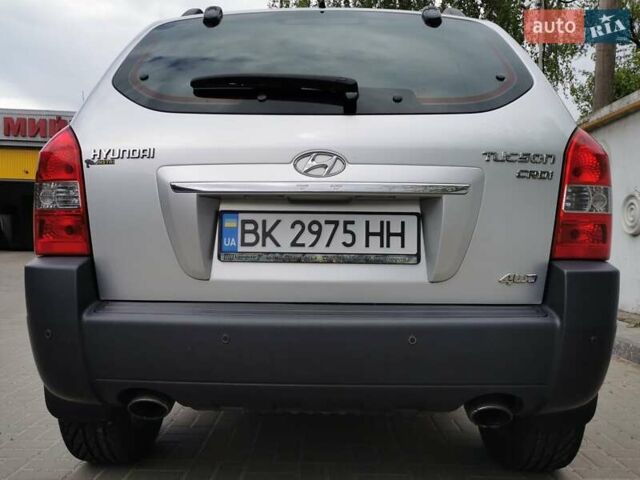 Сірий Хендай Туксон, об'ємом двигуна 1.99 л та пробігом 183 тис. км за 9100 $, фото 1 на Automoto.ua