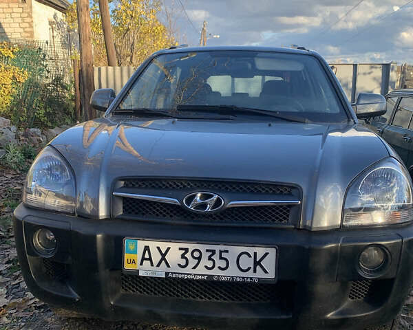 Сірий Хендай Туксон, об'ємом двигуна 2 л та пробігом 59 тис. км за 10400 $, фото 1 на Automoto.ua