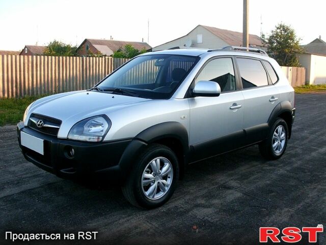 Серый Хендай Туксон, объемом двигателя 2 л и пробегом 370 тыс. км за 13300 $, фото 1 на Automoto.ua