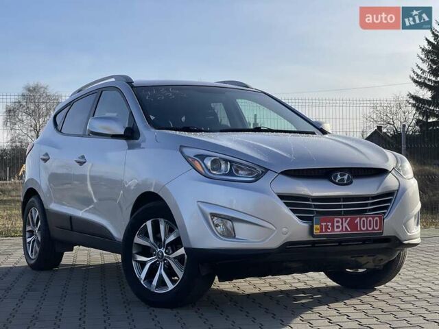 Сірий Хендай Туксон, об'ємом двигуна 2.4 л та пробігом 240 тис. км за 11300 $, фото 1 на Automoto.ua