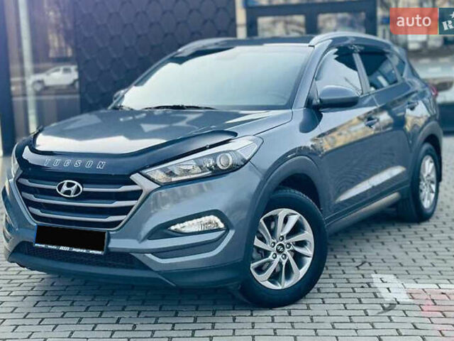 Серый Хендай Туксон, объемом двигателя 2 л и пробегом 79 тыс. км за 15500 $, фото 1 на Automoto.ua
