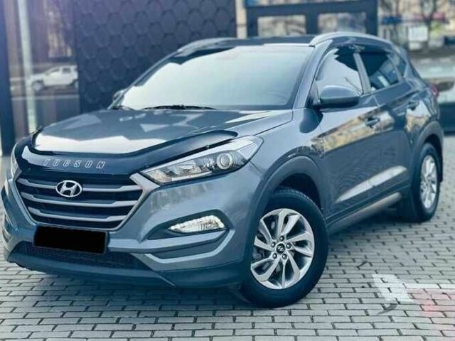 Серый Хендай Туксон, объемом двигателя 2 л и пробегом 79 тыс. км за 13500 $, фото 1 на Automoto.ua