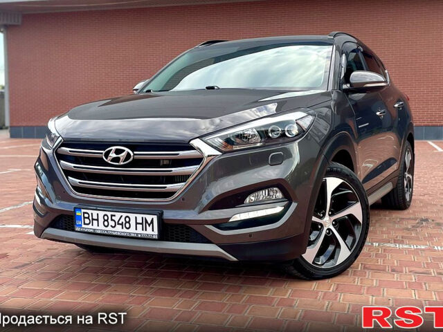 Серый Хендай Туксон, объемом двигателя 2 л и пробегом 109 тыс. км за 21700 $, фото 1 на Automoto.ua