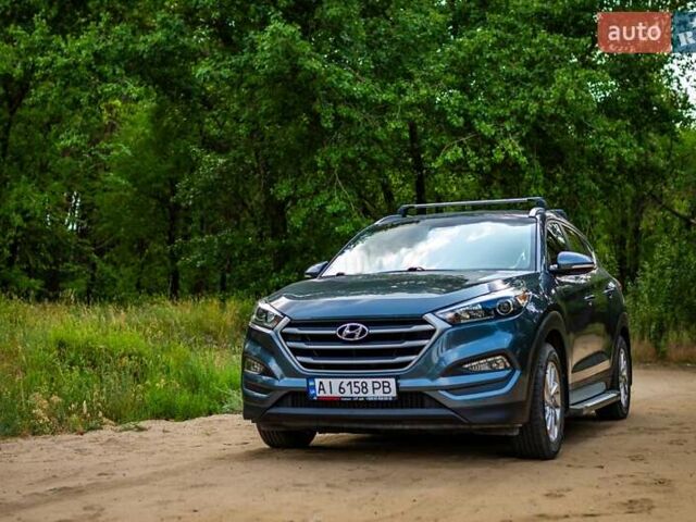 Серый Хендай Туксон, объемом двигателя 2 л и пробегом 124 тыс. км за 19200 $, фото 1 на Automoto.ua