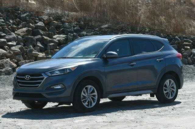 Сірий Хендай Туксон, об'ємом двигуна 2 л та пробігом 45 тис. км за 5450 $, фото 1 на Automoto.ua