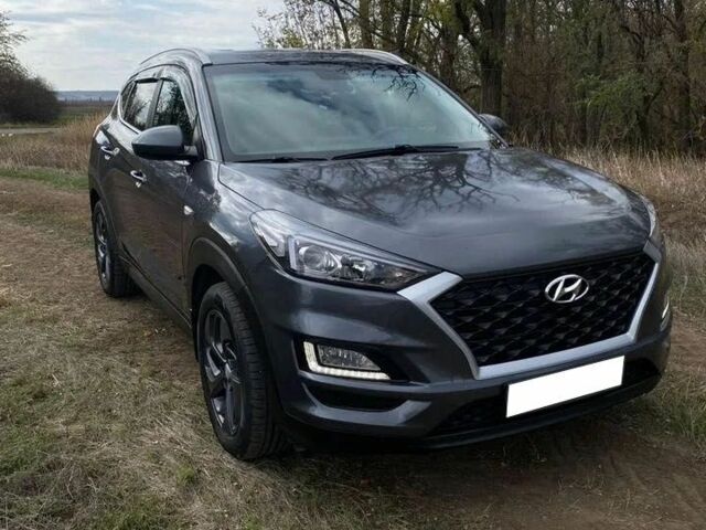 Серый Хендай Туксон, объемом двигателя 2 л и пробегом 99 тыс. км за 9600 $, фото 1 на Automoto.ua