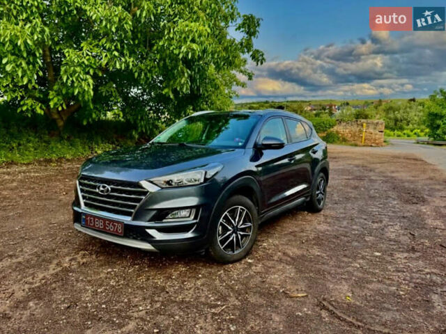 Серый Хендай Туксон, объемом двигателя 1.6 л и пробегом 110 тыс. км за 16999 $, фото 1 на Automoto.ua