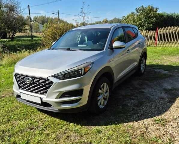 Серый Хендай Туксон, объемом двигателя 2 л и пробегом 105 тыс. км за 11000 $, фото 1 на Automoto.ua