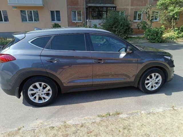 Серый Хендай Туксон, объемом двигателя 2 л и пробегом 53 тыс. км за 22300 $, фото 1 на Automoto.ua