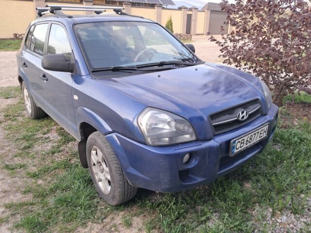 Синий Хендай Туксон, объемом двигателя 2 л и пробегом 359 тыс. км за 7000 $, фото 1 на Automoto.ua