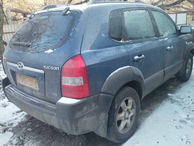 Синий Хендай Туксон, объемом двигателя 2 л и пробегом 240 тыс. км за 3300 $, фото 1 на Automoto.ua