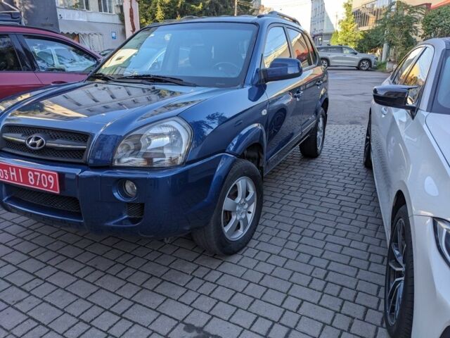 Синий Хендай Туксон, объемом двигателя 2 л и пробегом 195 тыс. км за 7300 $, фото 1 на Automoto.ua