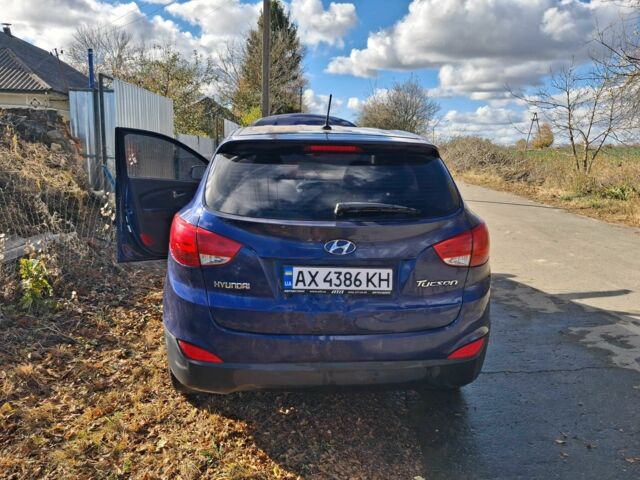 Синий Хендай Туксон, объемом двигателя 2 л и пробегом 150 тыс. км за 7950 $, фото 1 на Automoto.ua