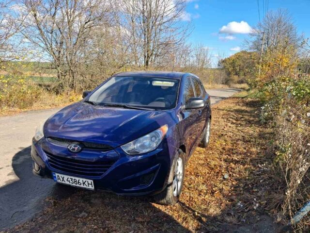 Синий Хендай Туксон, объемом двигателя 2 л и пробегом 241 тыс. км за 9100 $, фото 1 на Automoto.ua