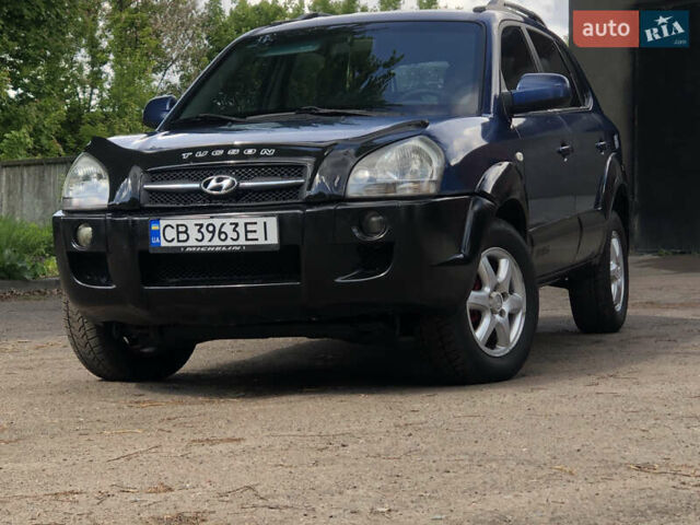 Синий Хендай Туксон, объемом двигателя 1.99 л и пробегом 315 тыс. км за 6700 $, фото 1 на Automoto.ua