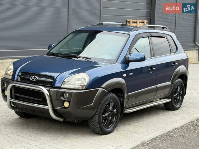 Синий Хендай Туксон, объемом двигателя 2.66 л и пробегом 320 тыс. км за 6300 $, фото 1 на Automoto.ua