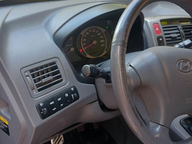 Синій Хендай Туксон, об'ємом двигуна 2 л та пробігом 288 тис. км за 7600 $, фото 1 на Automoto.ua