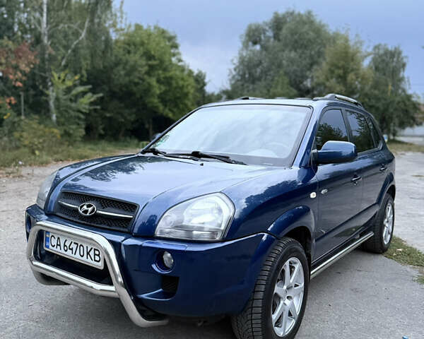 Синий Хендай Туксон, объемом двигателя 2 л и пробегом 202 тыс. км за 6100 $, фото 1 на Automoto.ua