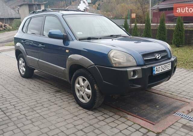 Синий Хендай Туксон, объемом двигателя 2.66 л и пробегом 320 тыс. км за 5500 $, фото 1 на Automoto.ua