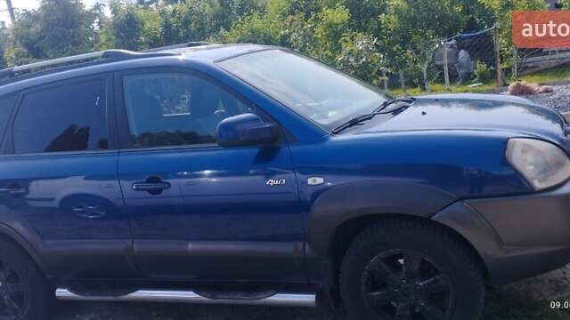 Синій Хендай Туксон, об'ємом двигуна 2 л та пробігом 350 тис. км за 7500 $, фото 1 на Automoto.ua