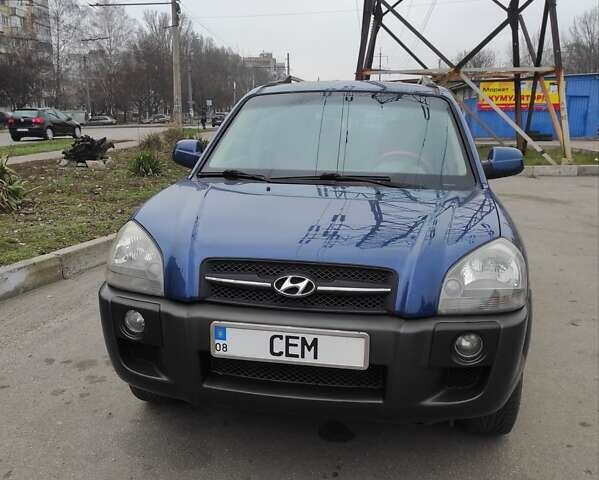 Синий Хендай Туксон, объемом двигателя 2 л и пробегом 225 тыс. км за 7300 $, фото 1 на Automoto.ua