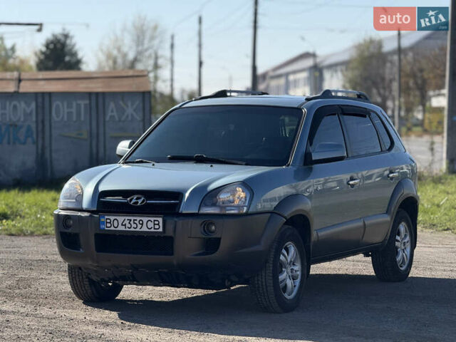 Синій Хендай Туксон, об'ємом двигуна 2 л та пробігом 317 тис. км за 6990 $, фото 1 на Automoto.ua