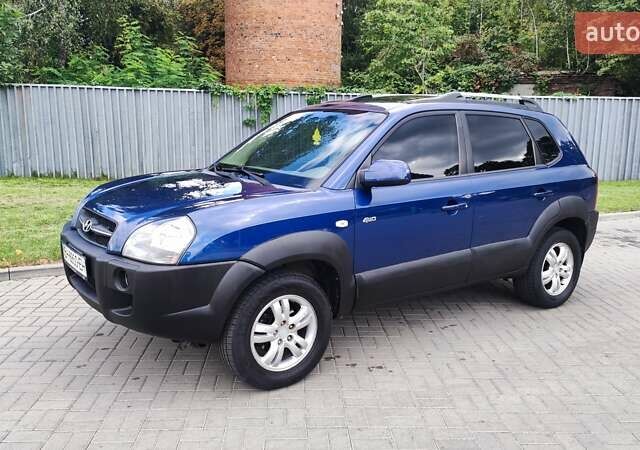 Синій Хендай Туксон, об'ємом двигуна 2 л та пробігом 225 тис. км за 7950 $, фото 1 на Automoto.ua