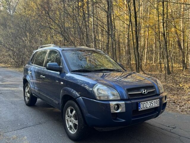 Синий Хендай Туксон, объемом двигателя 2 л и пробегом 291 тыс. км за 3400 $, фото 1 на Automoto.ua