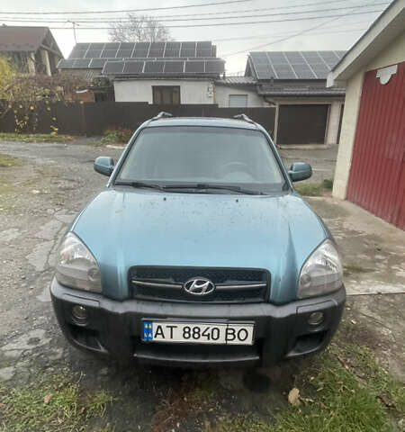 Синий Хендай Туксон, объемом двигателя 1.98 л и пробегом 277 тыс. км за 7500 $, фото 1 на Automoto.ua