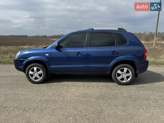 Синій Хендай Туксон, об'ємом двигуна 1.98 л та пробігом 160 тис. км за 7900 $, фото 1 на Automoto.ua