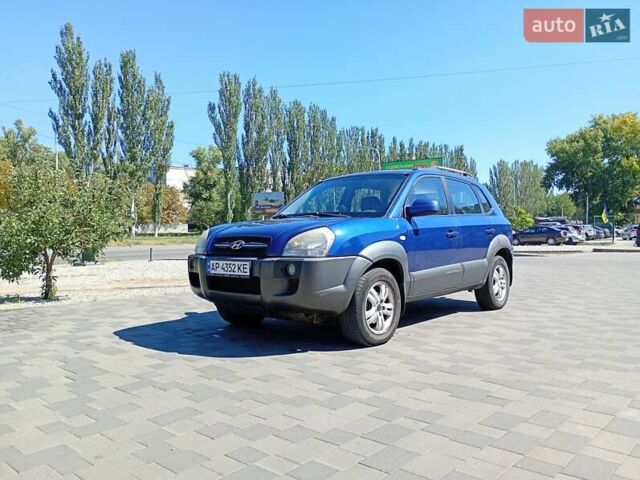 Синий Хендай Туксон, объемом двигателя 1.98 л и пробегом 203 тыс. км за 7000 $, фото 1 на Automoto.ua