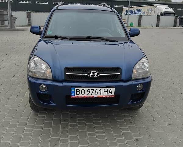 Синий Хендай Туксон, объемом двигателя 1.98 л и пробегом 201 тыс. км за 9400 $, фото 1 на Automoto.ua