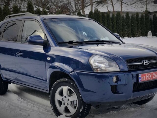 Синий Хендай Туксон, объемом двигателя 2 л и пробегом 204 тыс. км за 8500 $, фото 1 на Automoto.ua