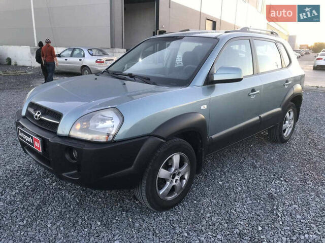 Синий Хендай Туксон, объемом двигателя 2 л и пробегом 207 тыс. км за 7990 $, фото 1 на Automoto.ua