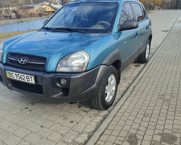 Синій Хендай Туксон, об'ємом двигуна 2 л та пробігом 147 тис. км за 9300 $, фото 1 на Automoto.ua