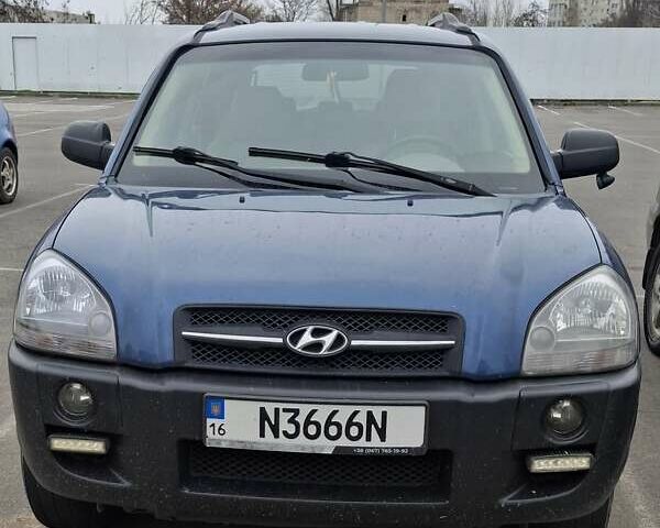 Синій Хендай Туксон, об'ємом двигуна 1.98 л та пробігом 200 тис. км за 8600 $, фото 1 на Automoto.ua